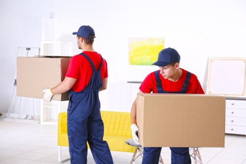 Furniture removal team planning a move in Bermondsey street