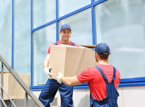 Furniture and boxes being loaded by a Bermondsey moving team