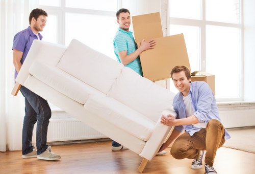 Removal team planning a Bermondsey flat move near local apartment buildings