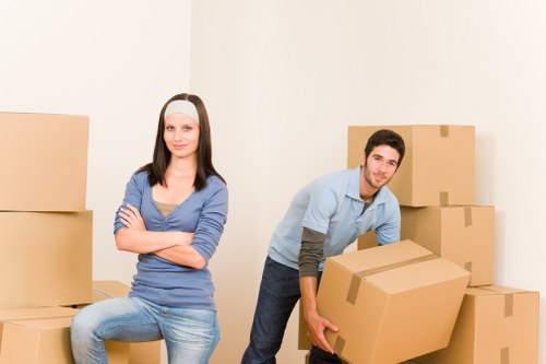Unpacking boxes and arranging rooms after a move in Bermondsey