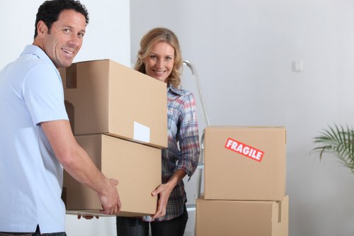 Team handling office furniture and equipment during a local relocation